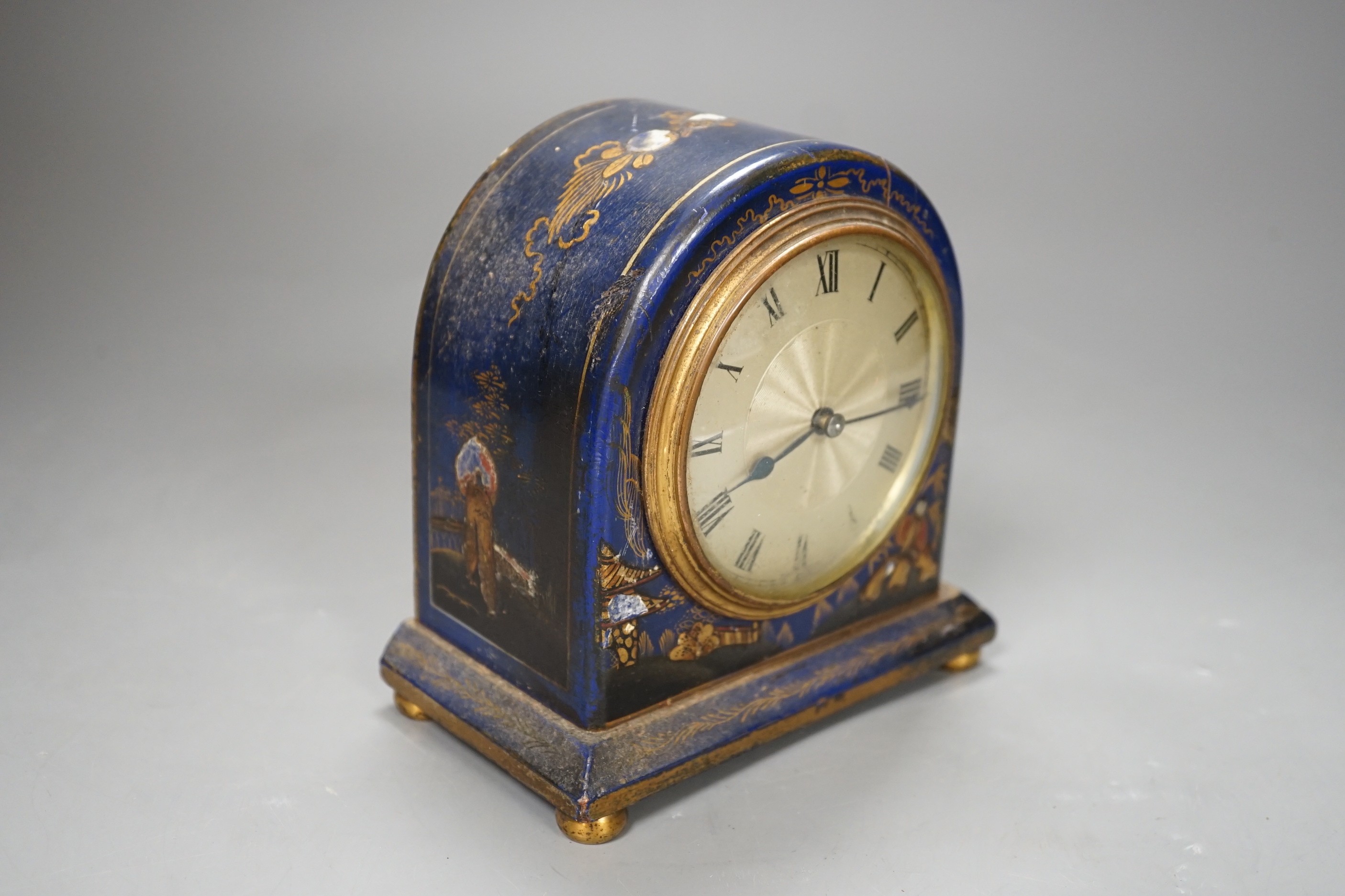 A small Chinoiserie lacquer cased mantle timepiece, (with damage) 14cm tall